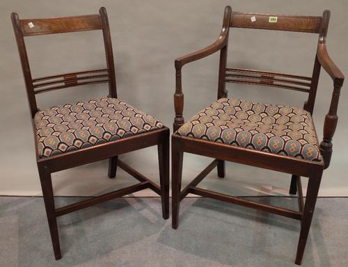 A set of seven 19th century mahogany bar back dining chairs to include one carver, 55cm wide x 84cm high, (7).