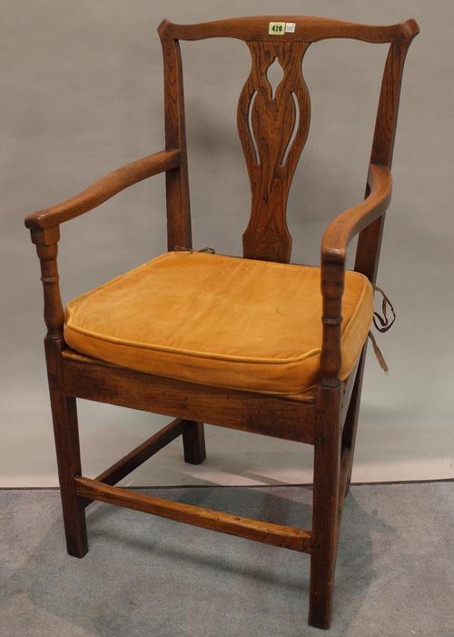 A 19th century ash and elm open armchair on tapering square supports, 54cm wide x 96cm high.