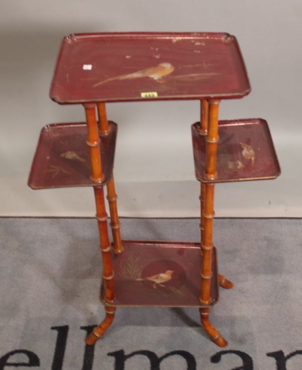 An early 20th century bamboo and red lacquer Chinese three tier stand, 57cm wide x 81cm high.