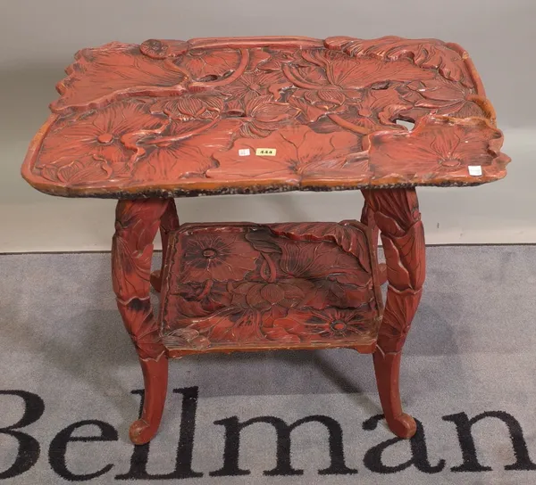 An early 20th century red lacquer Chinese two tier table, 75cm wide x 69cm high.