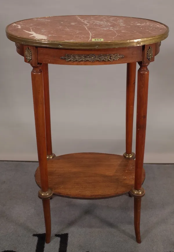 A 19th century French stained beech oval occasional table with inset marble top, 51cm wide x 80cm high.