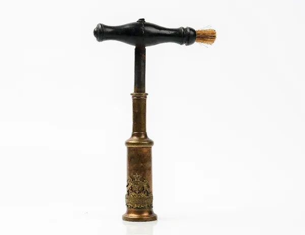 An Edwin Cotterill corkscrew, mid-19th century, with turned ebony handle and brush, the barrel with a Royal Coat of Arms badge marked `Edwin Cotterill