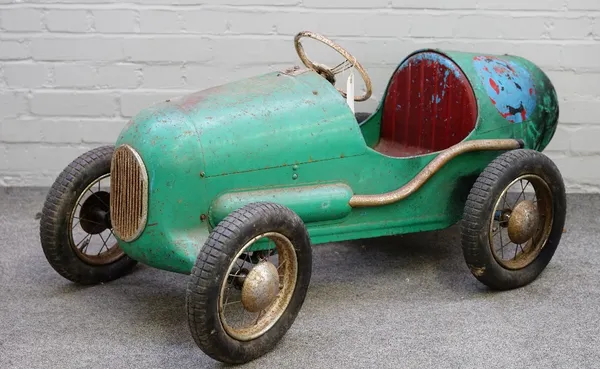 A 1950s Triang Super 8 Racer pedal car, repainted in green, with four 13inch pneumatic tyres, length 124cm.