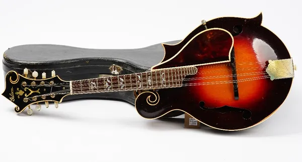 A Gibson F12 mandolin, serial no. 91331, with original Kalamazoo paper label, length approx. 68cm, in a fitted hard case with a pouch containing torto