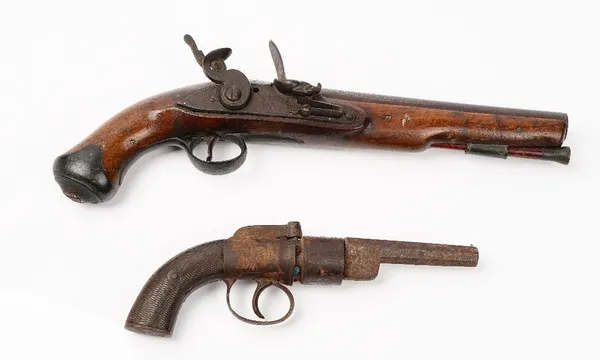 A Tower flintlock pistol, circa 1850, with circular steel barrel, 23cm, lockplate engraved 'TOWER GR' with lion and crown cypher,39cm overall, and a 1