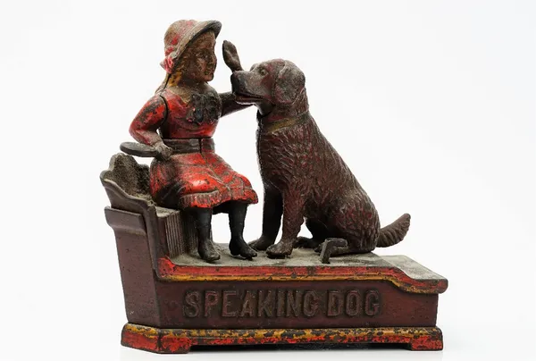 A Victorian polychrome painted cast iron automaton money box, detailed 'Speaking Dog Bank', 19.5cm wide.