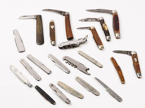 A group of twenty one pocket knives, mostly steel cased, including examples by Schrade U.S.A, Saynor of Sheffield, A.Wright & Son and Impenal, (21).