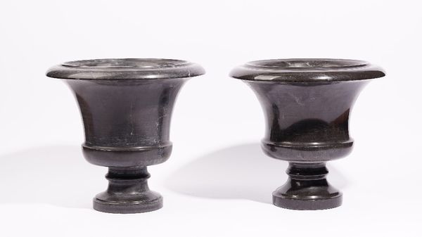 A pair of grey marble campana urns, 20th century, 32cm high.