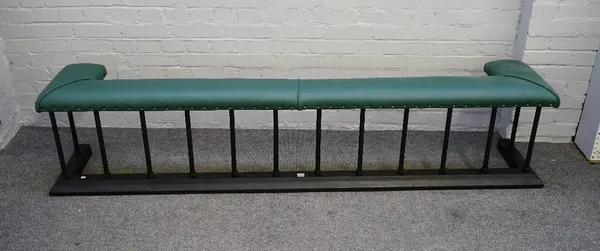 A Victorian style black painted steel and green leather upholstered club fender, 213cm wide x 46cm high.