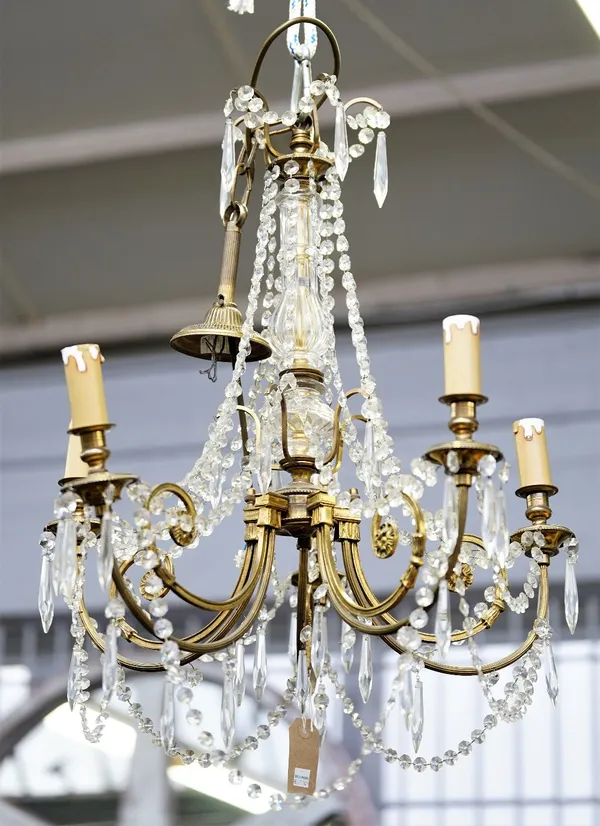 A 20th century French gilt metal and cut glass six-light chandelier, 57cm high.