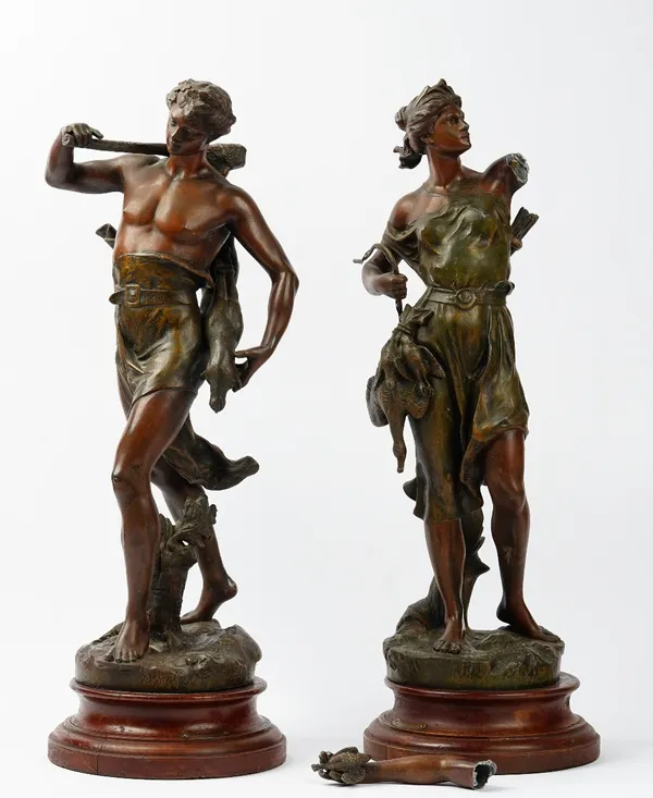 After Jean Baptiste Germain, a pair of French bronzed spelter figures of a hunter and huntress (arm broken), 67cm high.