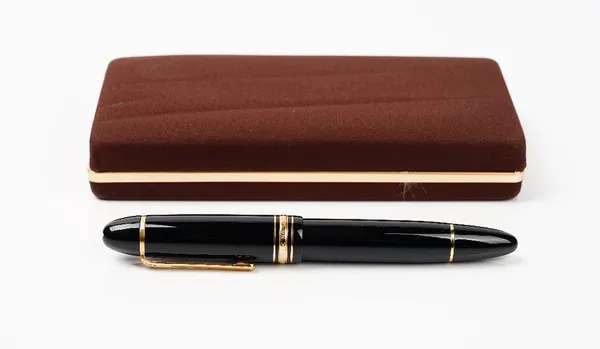 A Mont Blanc Meisterstuck No.149 fountain pen, the nib numbered 4810 and detailed 18c 750 MONTBLANC 149, with a Mont Blanc box and refill instruction