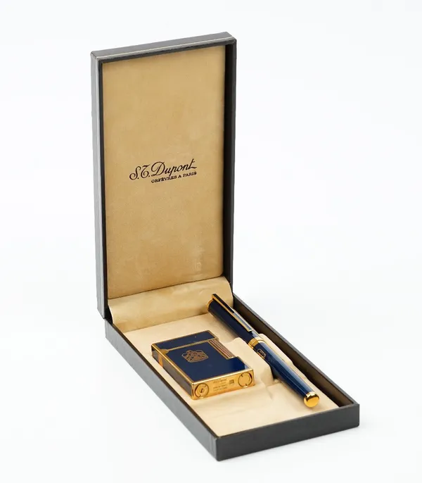 St Dupont, Paris a blue laque de chine fountain pen and matching lighter set, boxed.