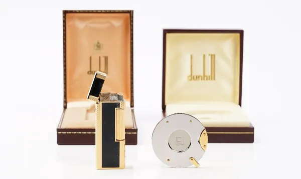 A Dunhill gold plated and black laque de chine gas lighter, boxed with guarantee card and booklets and a Dunhill bicolour cigar cutter with pouch, box