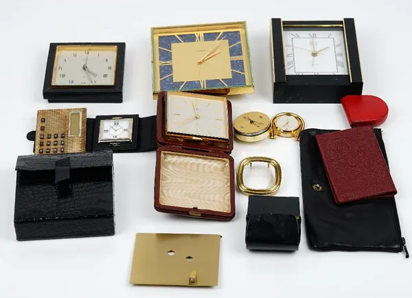 A group of seven Swiss travel alarm and desk clocks, by Ebel, Luxor, Looping, Swiza, Nepro and Turler and a calculator, (8).