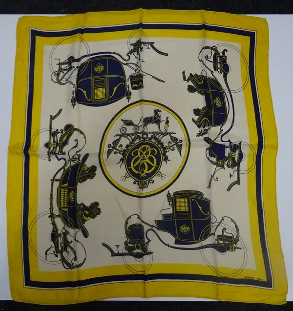 An Hermes silk scarf 'Ex Libris' designed by Hugo Grygkar circa 1946, decorated in navy blue and yellow colourway, depicting horse and carriage scenes