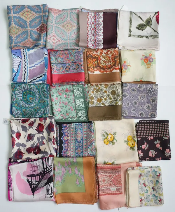 A collection of twenty Liberty of London printed silk head scarves, including an example entitled 'Liberty of London built from the timbers of HMS Hin