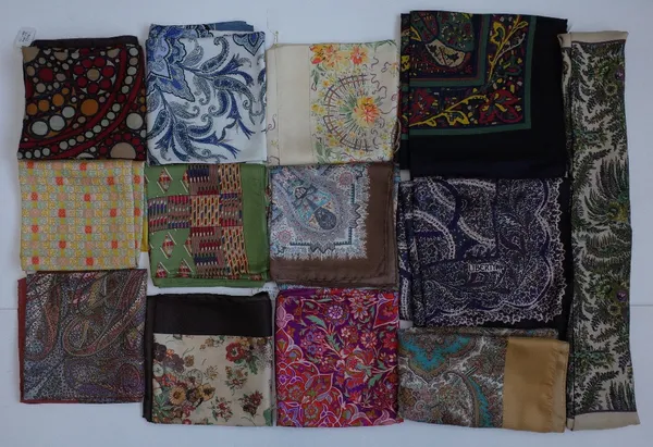 A collection eleven Liberty of London printed silk scarves, including examples printed with a paisley design and a geometric designed example to a gre