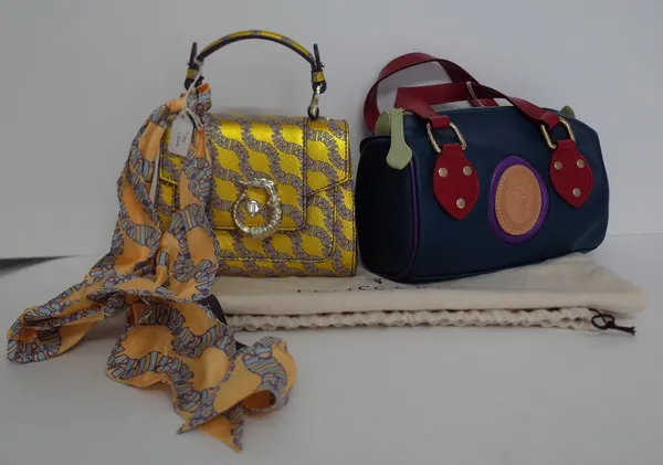 A Trussardi multicoloured leather holdall bag with two carrying handles and another Trussardi gold and purple handbag with scarf decoration (2)