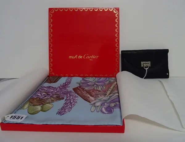 An Hermes printed silk scarf 'Jardin Secret' designed by Valerie Dawlat-Dumoulin, circa 2003 contained within a Must de Cartier presentation box, and