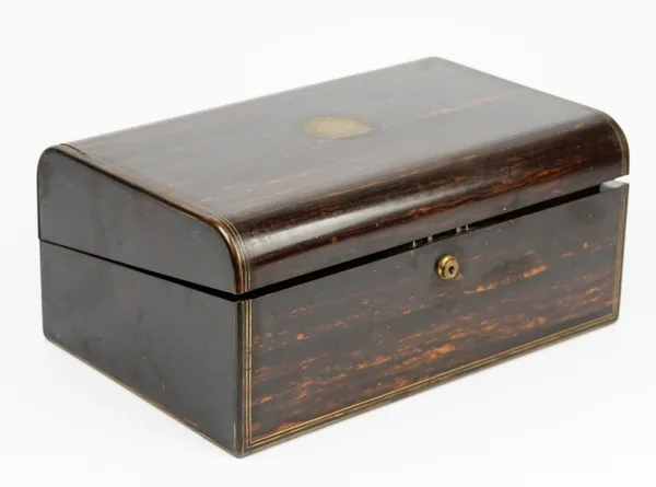 An early Victorian coromandel domed top writing slope, with fitted interior and Bramah lock, 38cm wide x 17cm high.