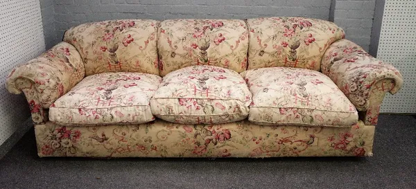 George Smith, a large triple hump back sofa in floral pattern upholstery, 250cm wide x 85cm high.