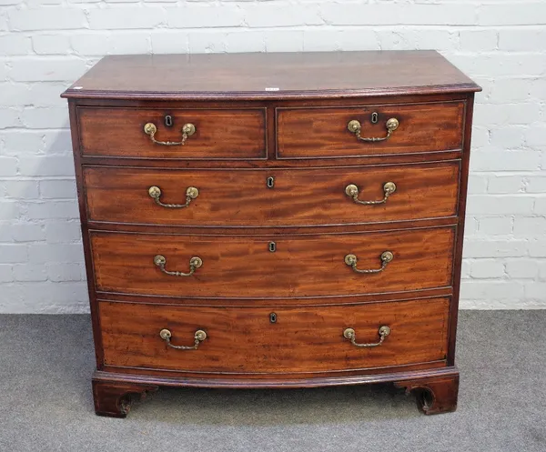 A George III mahogany bowfront chest of two short and three long graduated drawers on bracket feet, 102cm wide x 93cm high.