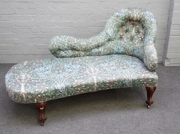 A small Victorian spoonback chaise longue with William Morris upholstery on faux rosewood scroll supports, 155cm wide x 82cm high.