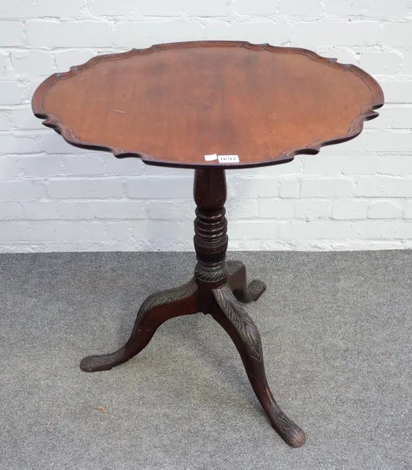 An 18th century Irish mahogany snap top piecrust occasional table on a tripod base, 68cm wide x 73cm high.