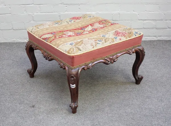 A Victorian rosewood square footstool with carved frieze on four scroll supports, 55cm wide x 38cm high.