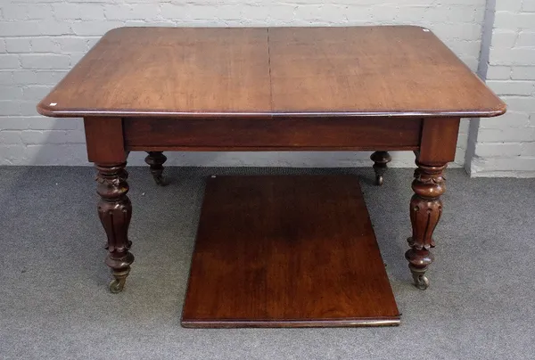 A William IV mahogany extending dining table, on fluted baluster supports with one extra leaf, 112cm wide x 144cm long x 216cm long fully extended.