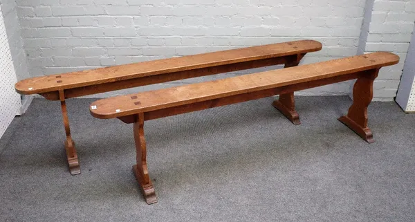 A pair of 19th century French oak benches, on baluster supports, 200cm wide x 54cm high, (2).