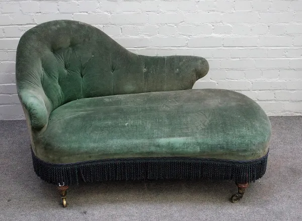 A small Victorian spoonback chaise longue on turned mahogany supports, 130cm wide x 75cm high.