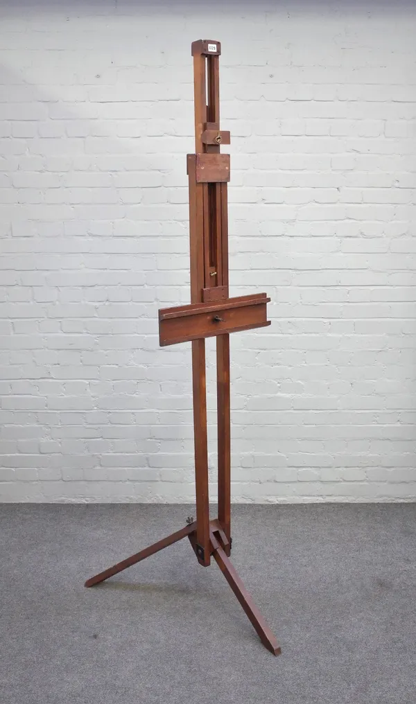 An early 20th century stained beech folding tripod artist's easel.