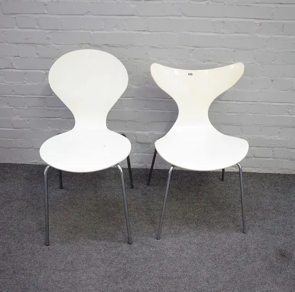 Fritz Hansen, Danish, a Lily chair, on tubular chrome supports, 47cm wide x 78cm high, together with a similar chair by Danerka 45cm wide x 85cm high.