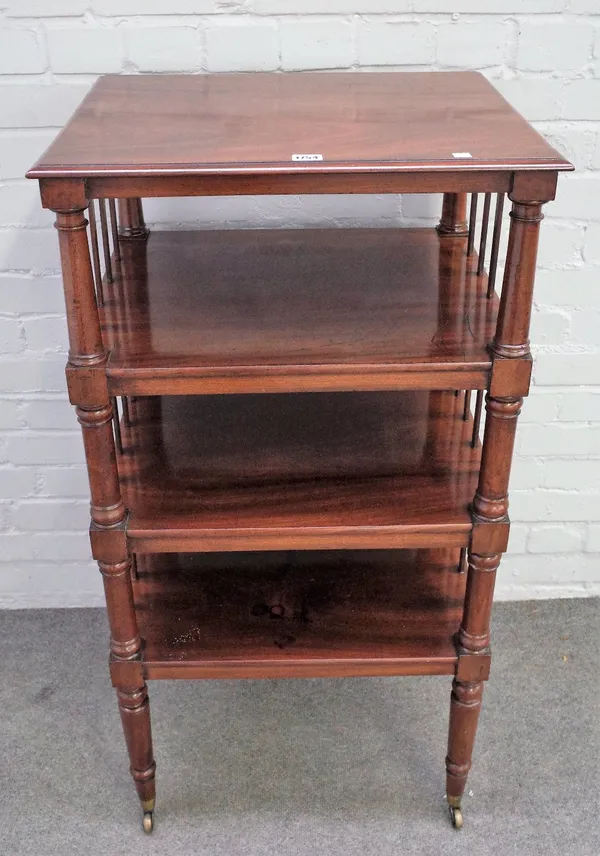 A George IV mahogany four tier what-not on turned supports, 56cm wide x 107cm high.