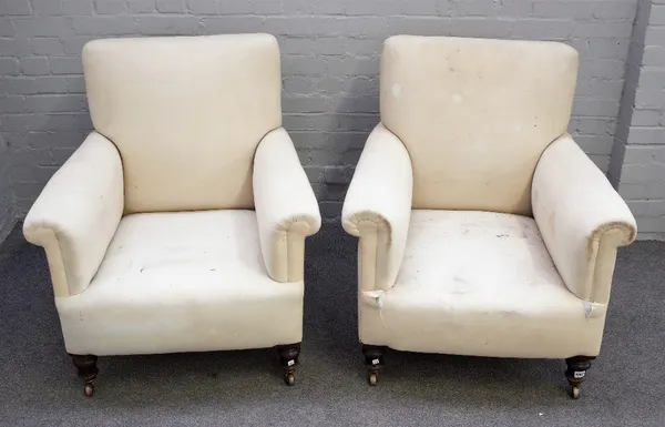 A pair of late 19th century square back easy armchairs with patterned loose upholstery on turned mahogany supports, 80cm wide x 102cm high (2).