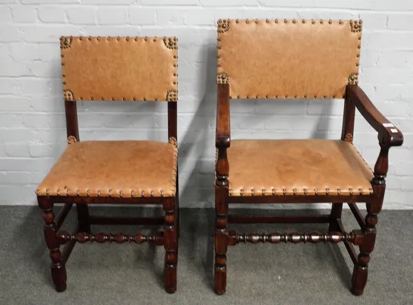 A set of eight Charles II style oak framed leather upholstered square back dining chairs, to include a pair of carvers (8).