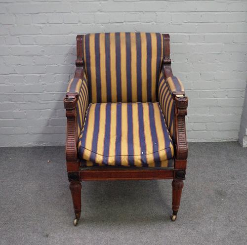 After Thomas Hope; a mahogany framed square back armchair on tapering turned supports, 67cm wide x 102cm high.