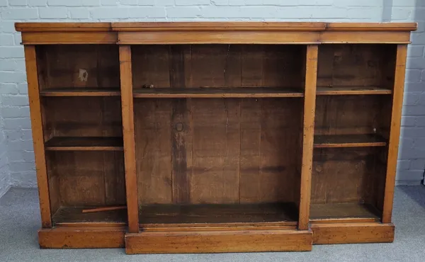 A Victorian mahogany floor standing breakfront open bookcase, on plinth base, 182cm wide x 112cm high.