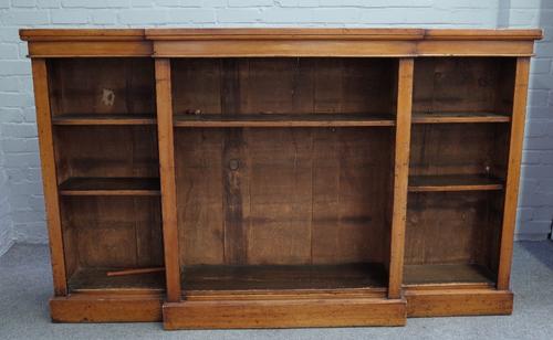 A Victorian mahogany floor standing breakfront open bookcase, on plinth base, 182cm wide x 112cm high.
