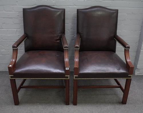 A pair of George III style mahogany framed hump back open armchairs on square supports, 62cm wide x 100cm high.