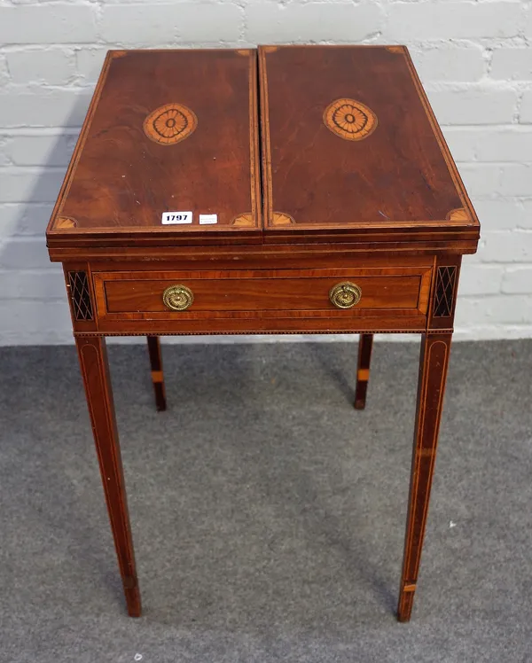 A George III inlaid mahogany double fold-out games table, with frieze drawer on tapering square supports, 45cm wide x 72cm high.