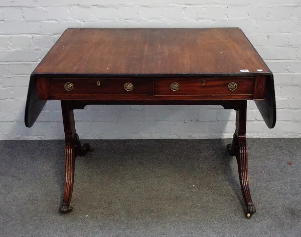 A George III mahogany sofa table, with opposing opposite frieze drawers, on four downswept supports, 92cm wide x 72cm high.