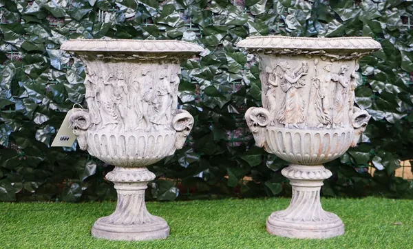 A pair of reconstituted stone jardinieres, relief moulded with rams heads and Greek figures, 35cm diameter x 47cm high.