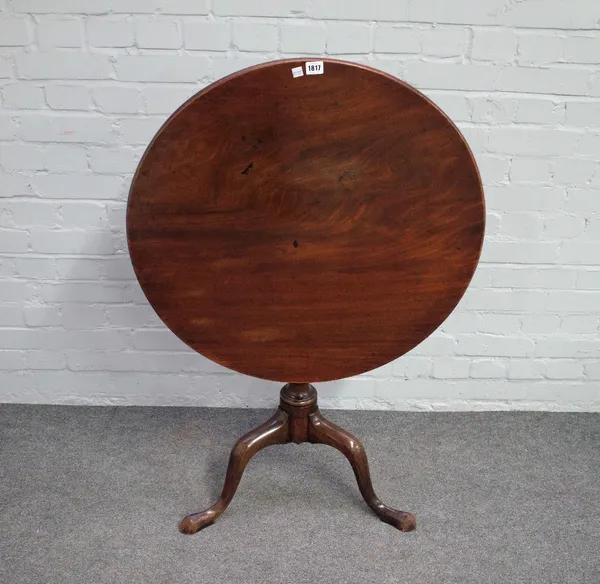 A mid-18th century mahogany circular snaptop occasional table on spiral fluted column on a tripod base, 74cm diameter x 73cm high.