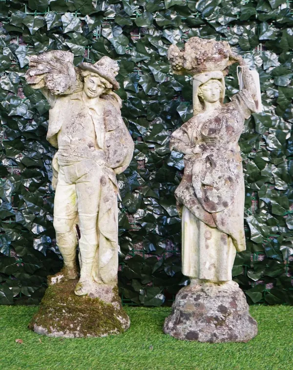 A pair of reconstituted stone figures modelled as a male and female flower seller, each approximately 80cm high.