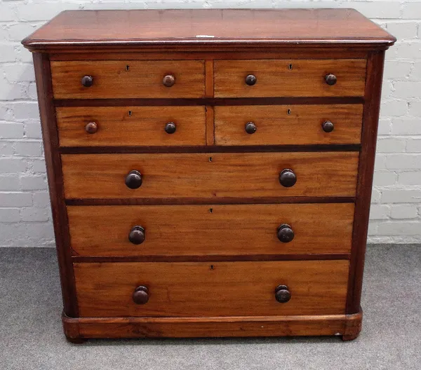 A Victorian mahogany chest with four short over three long graduated drawers on a plinth base, 105cm x 105cm high.