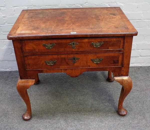 A George II crossbanded walnut lowboy with pair of frieze drawers on pad feet, 77cm wide x 70cm high.