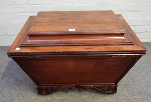 A late Regency mahogany sarcophagus shaped cellarette on carved bracket feet, 72cm wide x 52cm high.